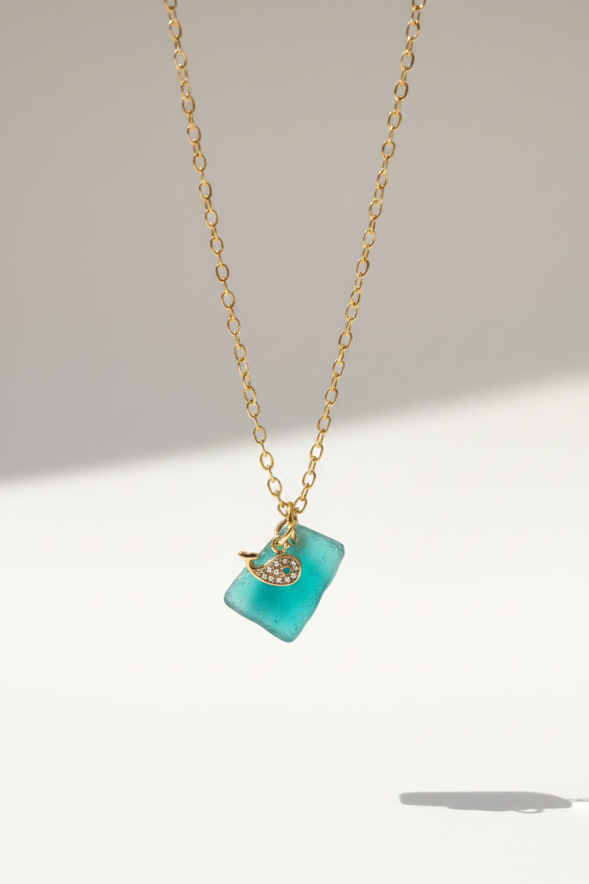 Halsband Ocean med liten val